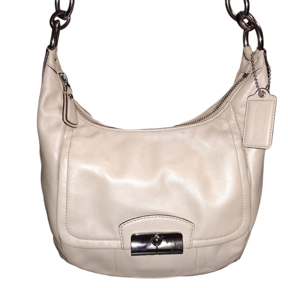 Coach Kristin Hobo Shoulder Bag
Ivory Champagne Color With Silver Hardware